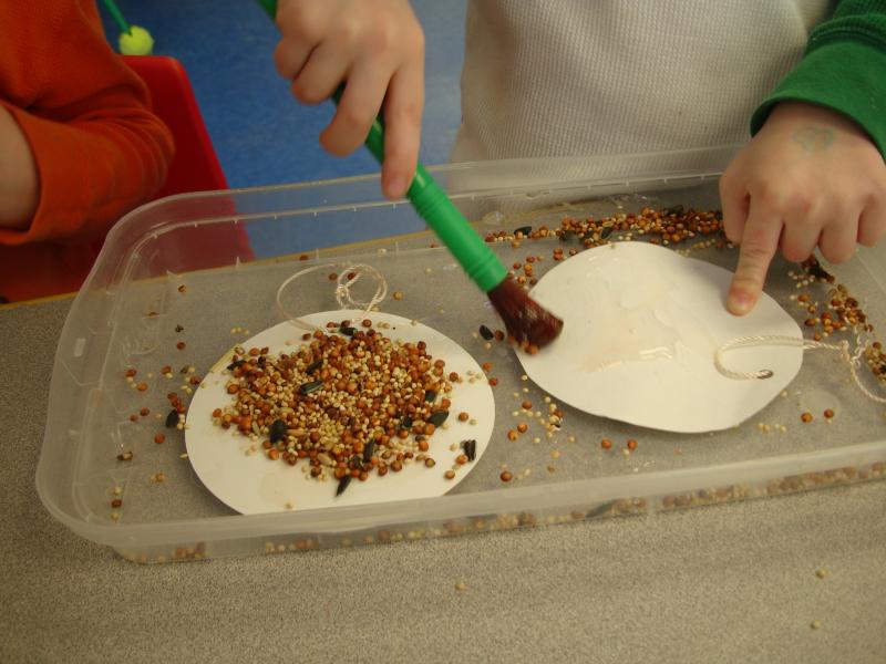 Making Simple Cardstock Bird Feeders In Preschool